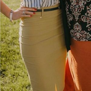 Skirt by Anthropologie, mustard color, knee length.